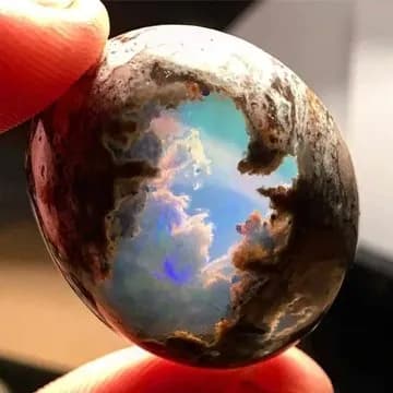 This opal, discovered in Queensland, Australia, appears to contain its own sky