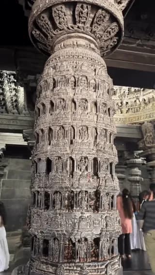 The 12th-century Narasimha Pillar at Belur, India. Carved out of soapstone during the Hoysala Empire- its miniature shrines are hollowed out from the inside and the entire column was engineered to rot
