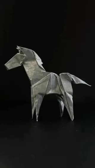 Folding a detailed origami horse from a single sheet of paper