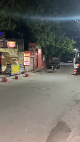 Bro casually rides a bull through the streets like it's a motorcycle.