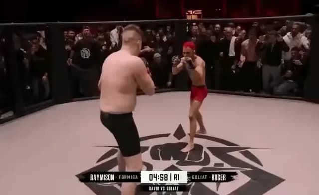 A 5'3" Jiu Jitsu Black Belt shows size isn’t everything against his 6’8” opponent in a MMA match.