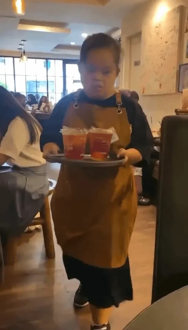 A coffee shop employs people with Down syndrome to affirm their humanity and break societal stigmas
