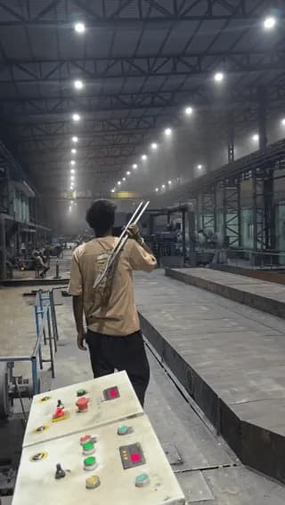 Metal fabrication worker handling 700°C + metal with safety on vacation