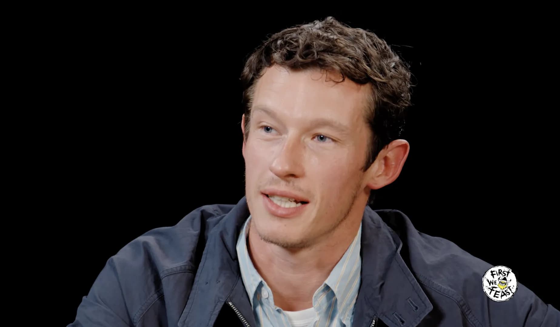 Callum turner takes on the 'Hot Ones' spicy wings, keeps his cool