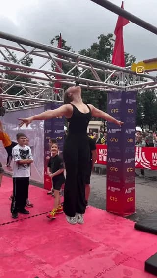 Aerialist performs an iron jaw routine