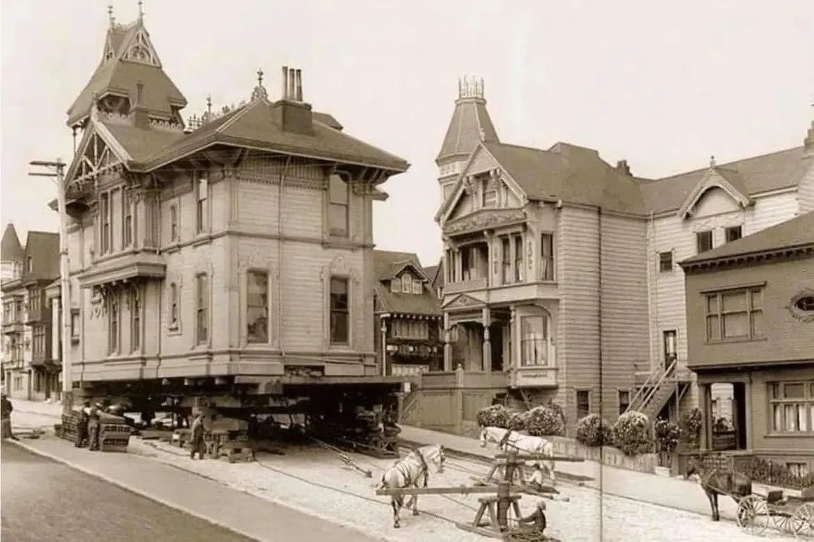 Moving a house using draught horses. San Francisco, 1908