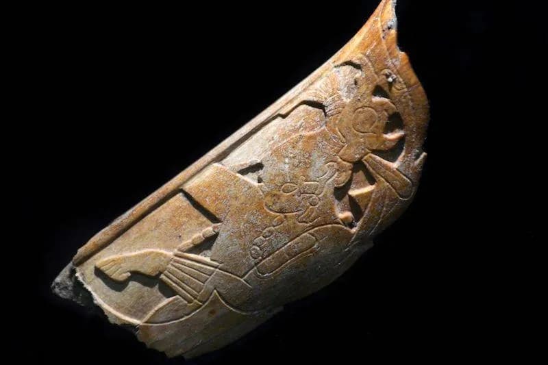 A 1,100-year-old Maya nose ornament carved from human bone, discovered in Palenque, Mexico.