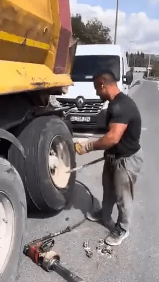 Changing a truck tire on the go