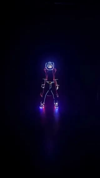 A laser dance show where the performers’ movements create these insane glowing visuals using light, lasers, and illuminated suits. [@royal.lasers on Instagram]
