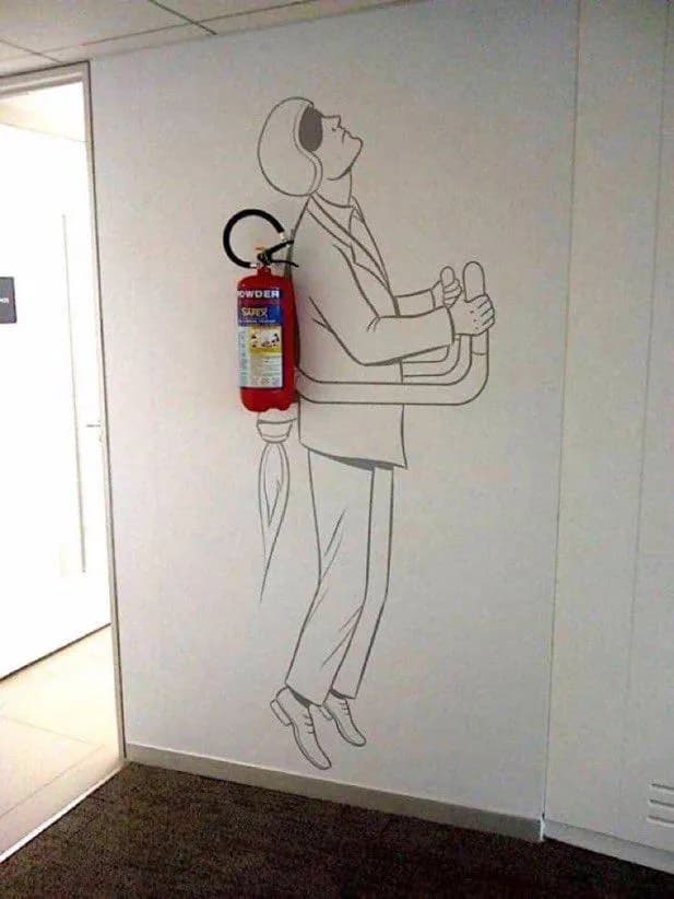 This wall decal turns an ordinary fire extinguisher into a jetpack