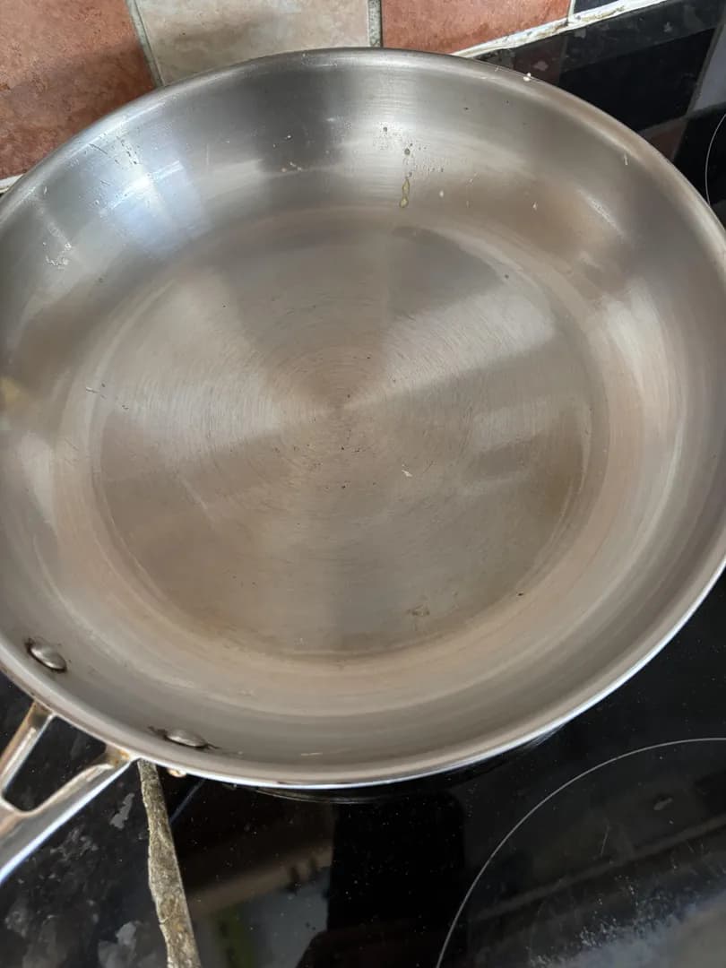 My stainless steel pan after cooking scrambled eggs
