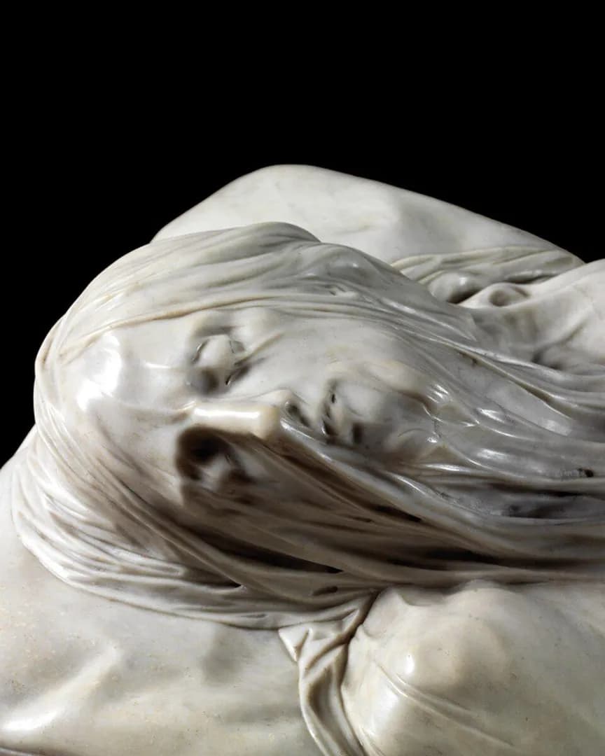 "The Veiled Christ" carved by Giuseppe Sanmartino in 1753. Made entirely from a single block of solid marble, the veil is sculpted so masterfully that it appears completely transparent, revealing the