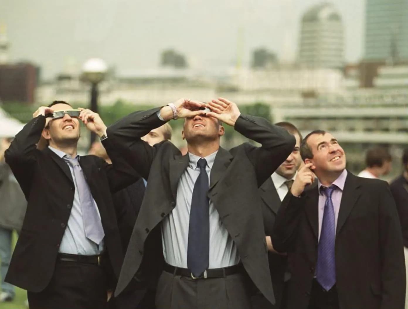 In 1999 London City workers shielded their eyes to view the solar eclipse, while Barry on the right protected his ear.