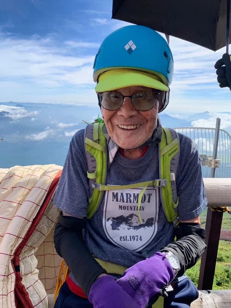 Kokichi Akuzawa, a Japanese mountaineer, set a remarkable world record by becoming the oldest person on record to summit Mount Fuji at the age of 102, completing the steep 12,388-foot climb with suppo