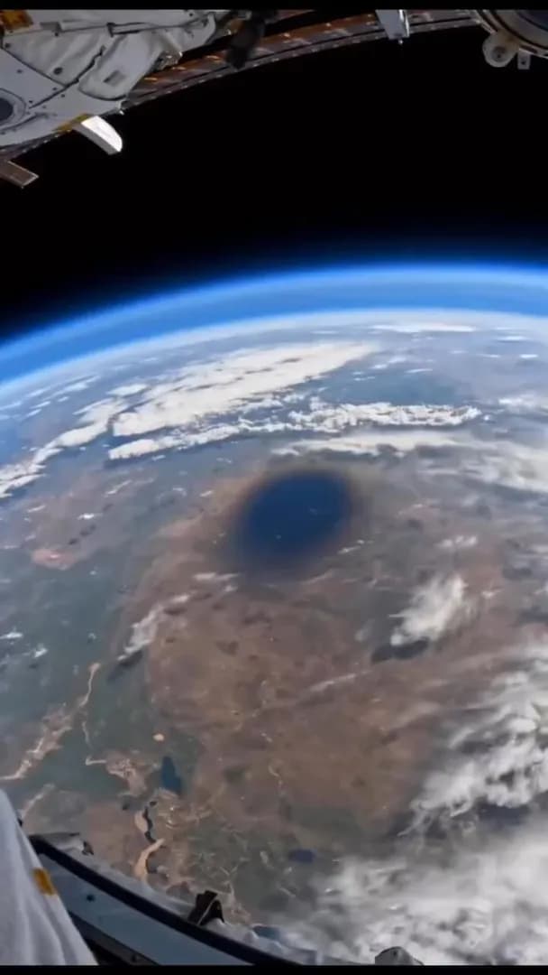 A view of the earth from the international space station during the solar eclipse. (NASA)