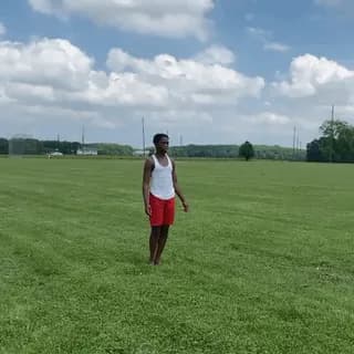 14-year-old gymnast Kaleb lands a standing double backflip on grass