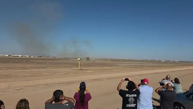 Powerful jet flyover, lady in the red was nearly vaporized.