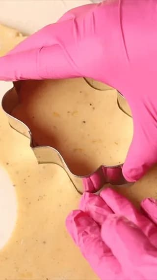 The process of decorating citrus-themed cookies with royal icing