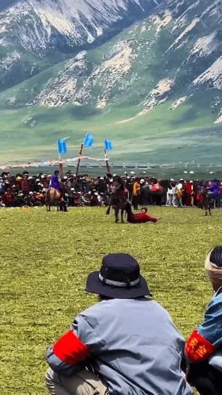 Horse rider showing his core strengths and tradition at a Tibetan grassland horse festival.