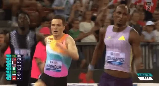 Alison dos Santos breaks the 400 meter hurdles world record in 45.80!