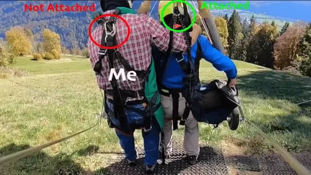 Tourist hangs on for his life, after pilot forgets to attach him to glider