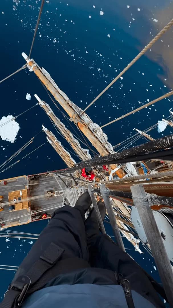 Sunset in Antarctica from a tall ship