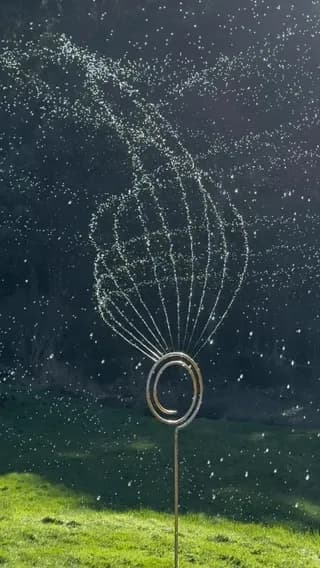 Could honestly sit in the grass and watch this sprinkler spin all day
