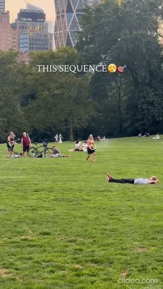 Three guys tossing a flying ring in Central Park