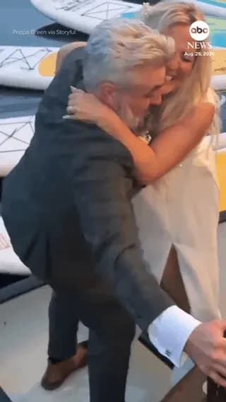 Wedding photo doesn't go as planned, but couple rolls with it