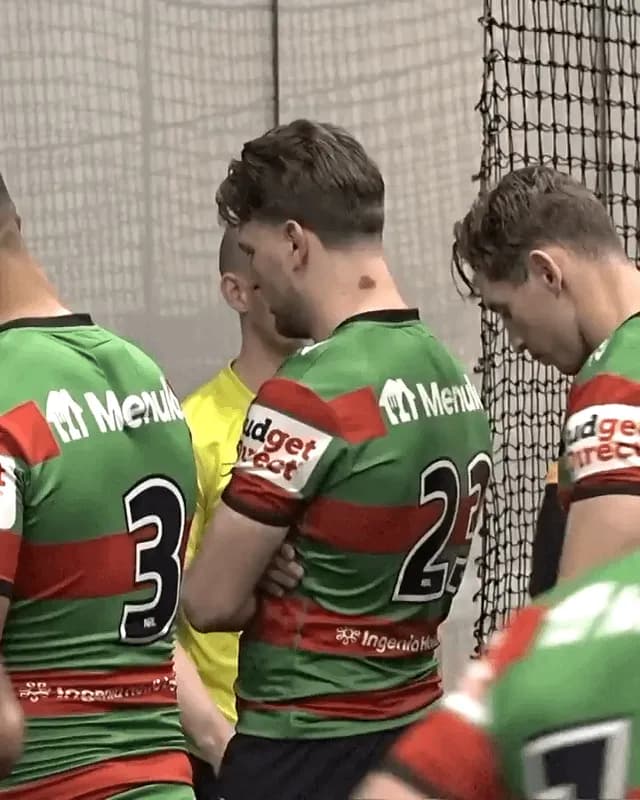 Jai Arrow leads the team out for his 100th appearance for South Sydney