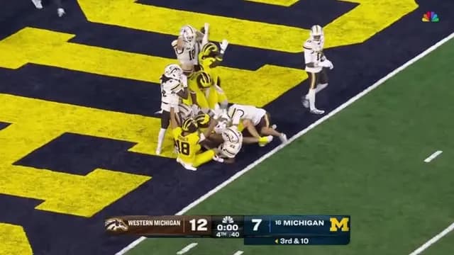 Michigan hits a Hail Mary to survive Western Michigan after 1 second was added back to the clock