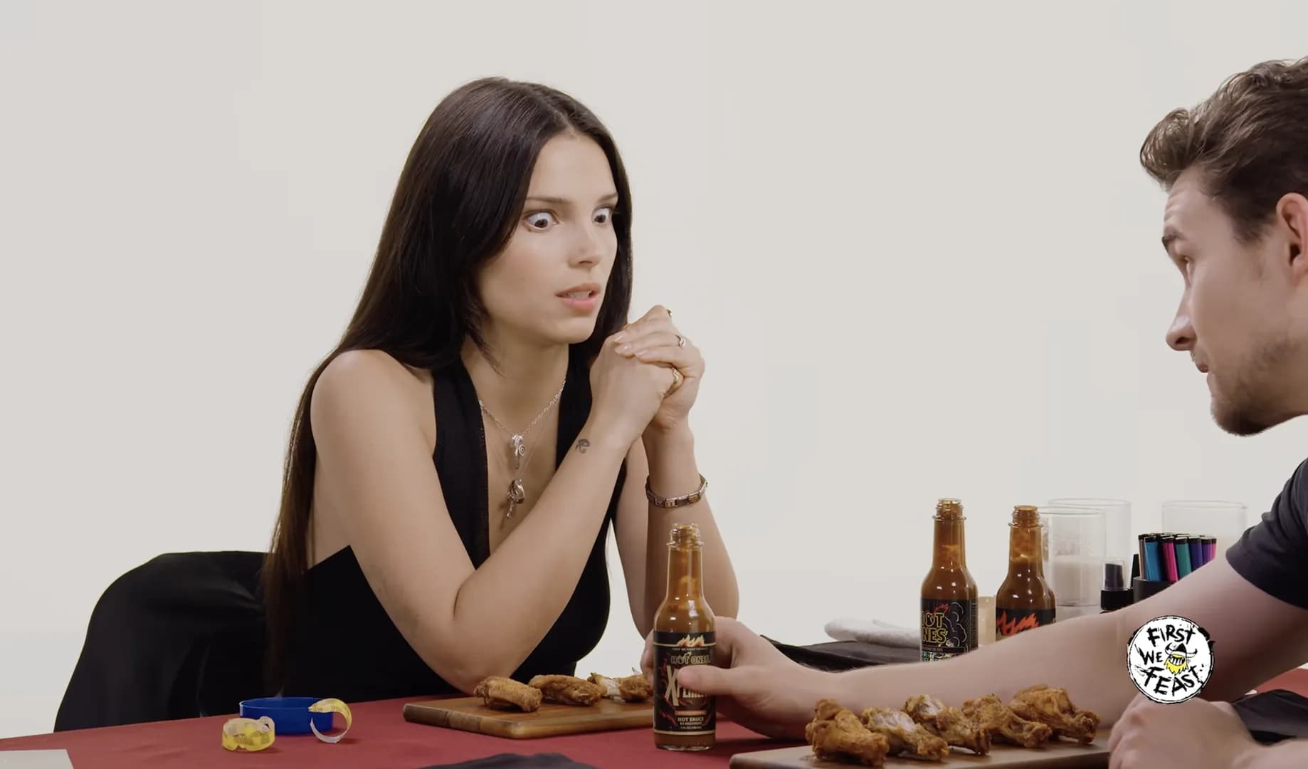 'Obsession' stars Inde Navarrette and Michael Johnston go head-to-head in hilarious 'Hot Ones Versus'