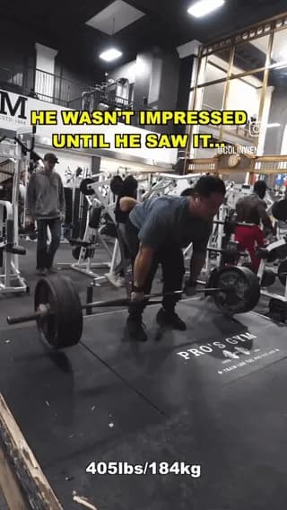 All bodybuilders in the gym stop to watch this professional weightlifter