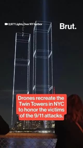 2,977 drone lights recreate Twin Towers to honor one for each victim who died in the 9/11 attacks.