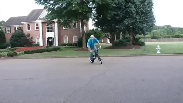 Grandpa's Muscle Memory Kicks In While Teaching His Grandson to Ride a Bike. Old Man Never Lost it.