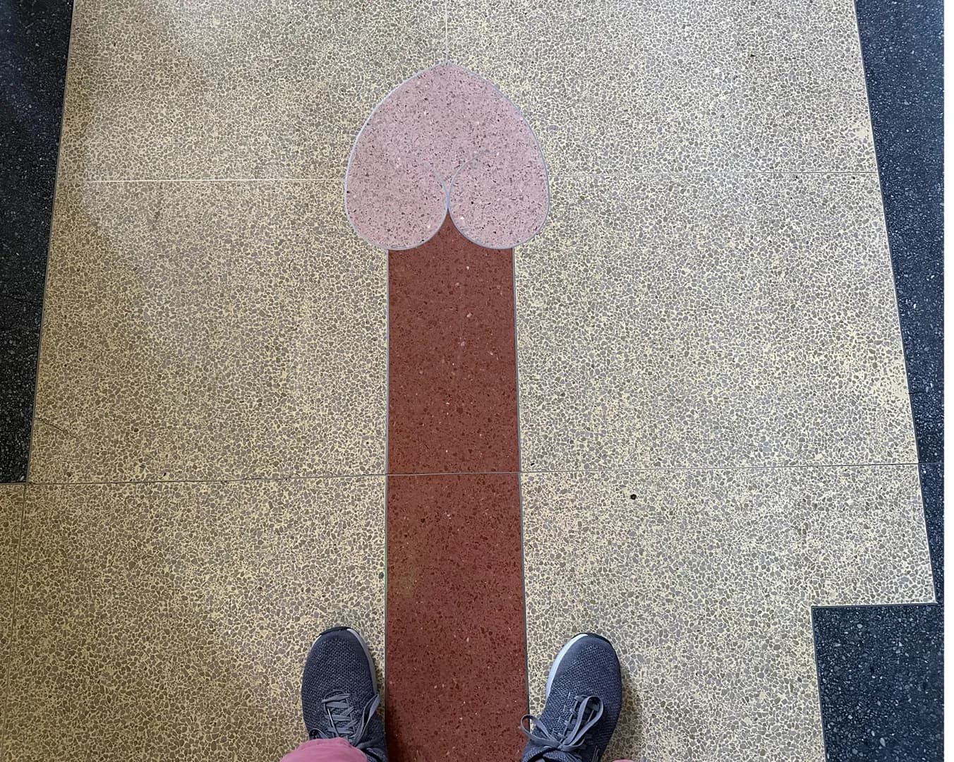 The Handy pathway tile hearts pointing your way in the TX state capitol building