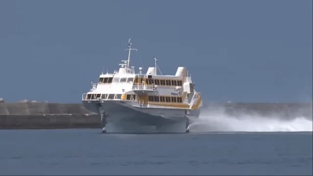 230-seat Boeing 929 Jetfoil arriving at Nishinoomote Port in Japan. The passenger ship is used for high-speed service between Kagoshima and Yakushima and includes 16 premium seats with extra-cushioned