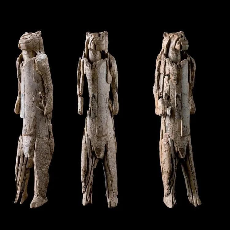 LION MAN OF HOHLENSTEIN STADEL. A 40,000 year old human lion sculpture carved from mammoth ivory. One of the oldest known works of figurative art.