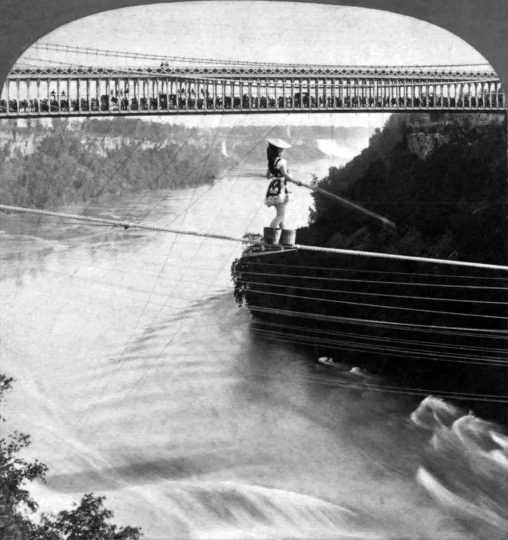 12 of July 1876, Tightrope walker Maria Spelterini crossed over the Niagara falls wearing peach baskets on her feet and using only a pole. 7 days later she did it blindfolded.