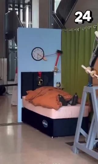 A Bed That Wakes, Cleans, Dresses and Feeds a Person