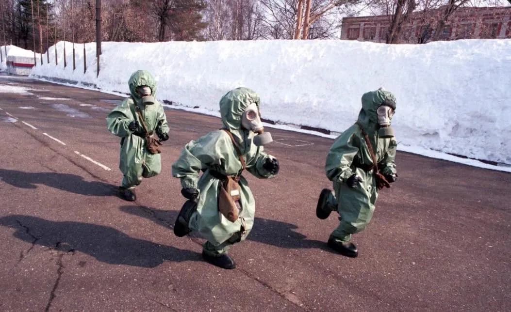 Post-Soviet visual. Children at a civil defense drill. Photo by Oleg Nikishin, Kineshma, Russia, 1999.