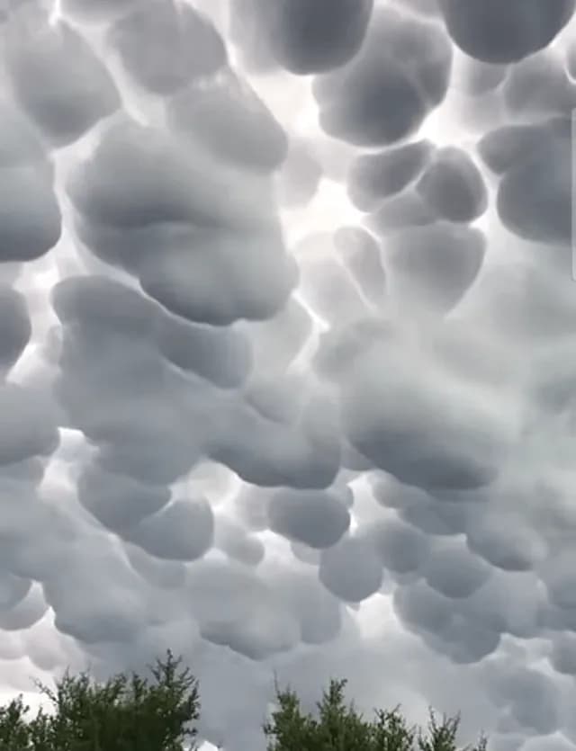 Rare Mammatus clouds over Argentina, formed by sinking pockets of ice and moisture after a severe storm.