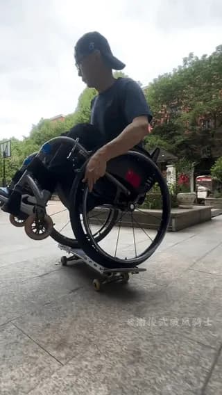 He got no excuse skateboarding on wheelchair
