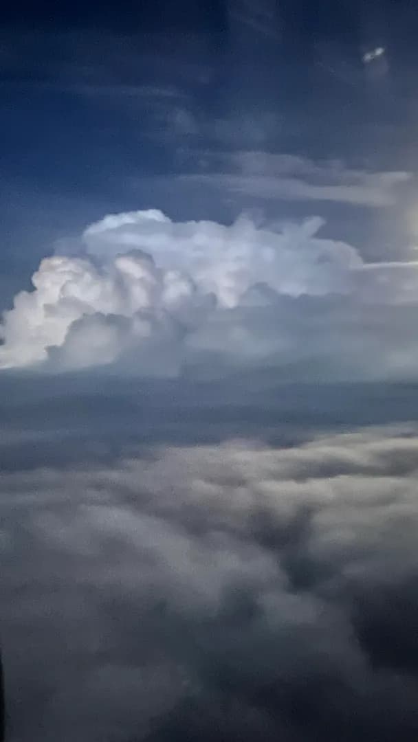 Thunderstorm cloud on a plane (sorry for the bad quality but that’s the best I can do while on a plane with a thunderstorm nearby)