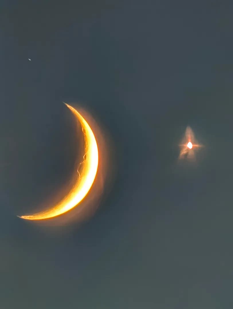 Crescent moon with Venus today ( as seen from different phones)