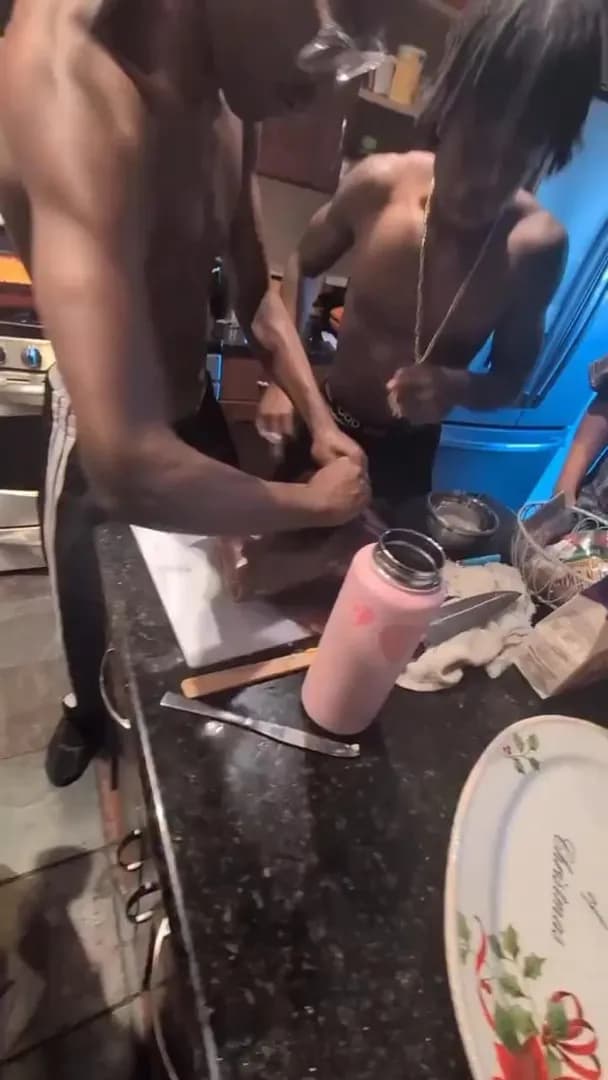 Young men celebrating their first brisket!