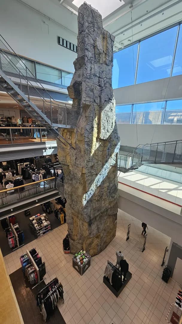 To the person who posted the rocky floor, this sports shop has a whole rock to test climbing shoes on