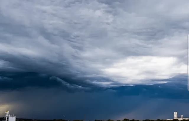 Undulatus Asperitas clouds making the sky look like a churning, apocalyptic ocean flipped upside down.