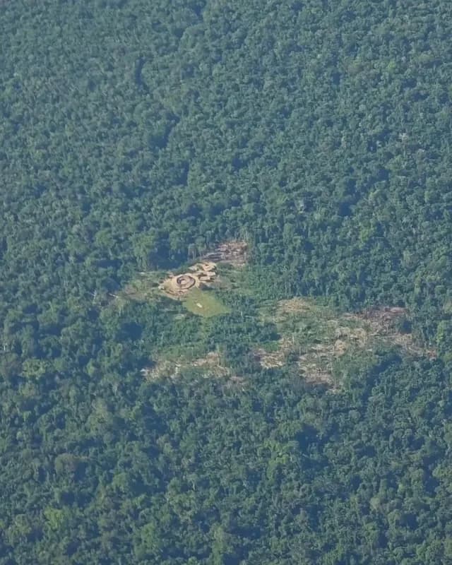 An isolated Indigenous tribe in the Amazon photographed from the air.