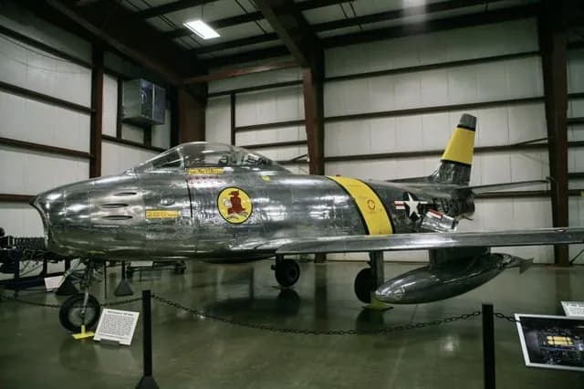TIL In 1956, an airforce mechanic with 2 hours flying experience was cleared to perform a high speed taxi run in an F-86. He accidentally took off but was talked down for a landing with minor damage.